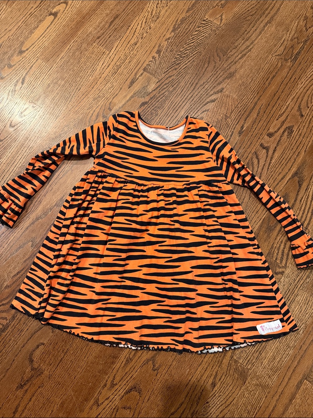 Flowersak boutique orange and black tiger print ruffle cuff dress 6/7